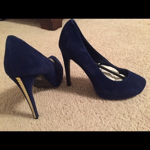 Blue spike heels